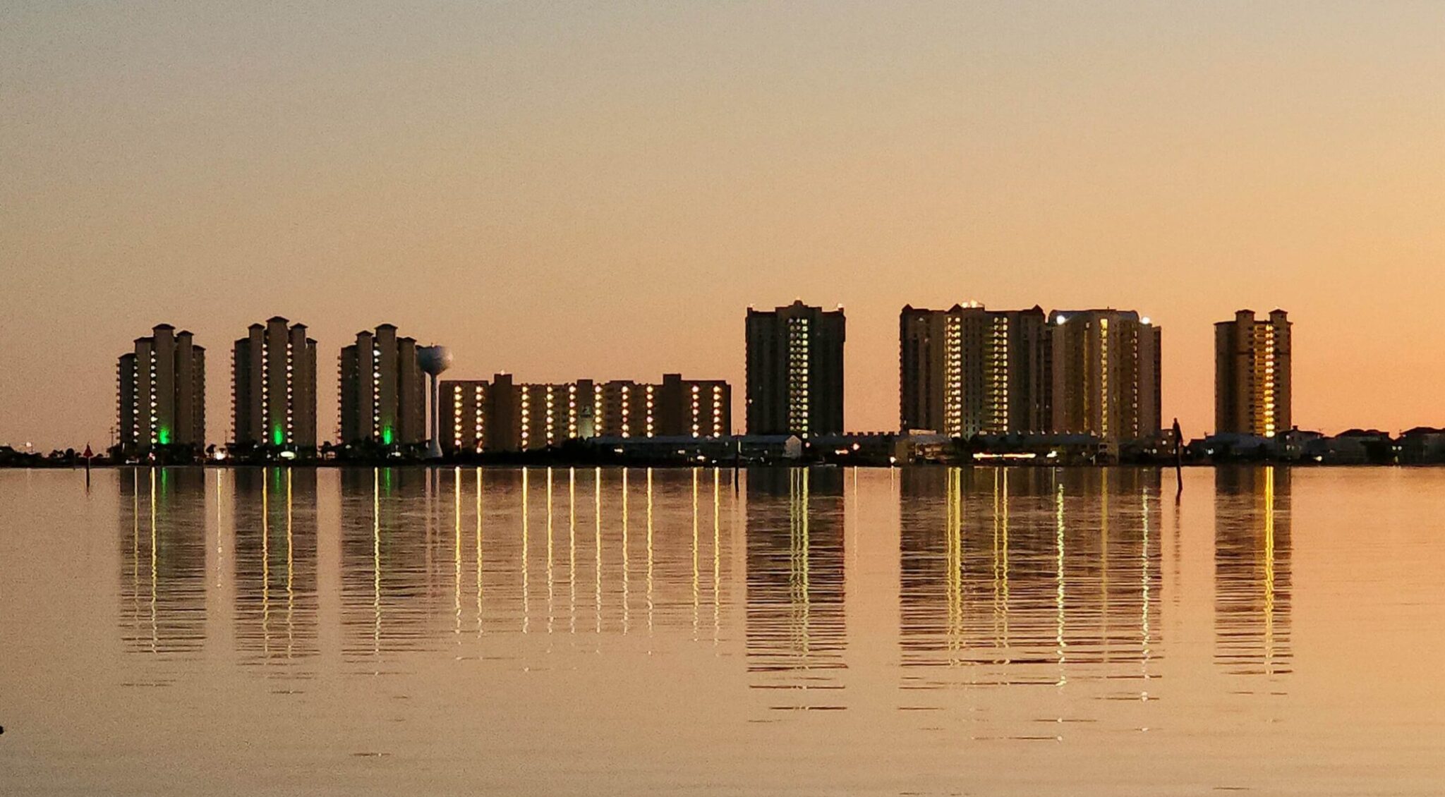 Navarre Beach at sunset, viewed across Santa Rosa Sound